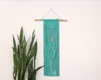 Turquoise green macrame wallhanging with birch pole