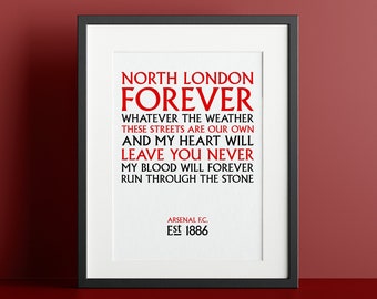 May include: A black framed print with white background and red text. The text reads "North London Forever" and includes the lyrics "Whatever the weather these streets are our own and my heart will leave you never my blood will forever run through the stone." The bottom of the print reads "Arsenal F.C. Est 1886."