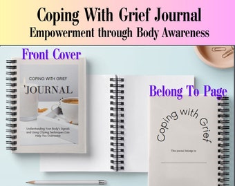 May include: A white journal with a black spiral binding. The front cover has the text "Coping With Grief 'Journal'" and the text "Understanding Your Body's Signals and Using Coping Techniques Can Help You Overcome". The back cover has the text "Belong To Page Coping With Grief This journal belongs to".