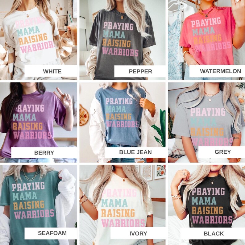 May include: A collection of t-shirts in various colors, each featuring the text "Praying Mama Raising Warriors" in a layered, colorful design. Colors include white, pepper, watermelon, berry, blue jean, grey, seafoam, ivory, and black.