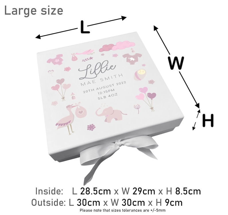 May include: A white gift box with a pink and white design featuring a stork, elephant, and balloons. The box is tied with a white satin ribbon and has the text "Lillie Mae Smith 20th August 2022 12:15PM 5LB 4OZ" printed on the front. The box measures 28.5 cm x 29 cm x 8.5 cm inside and 30 cm x 30 cm x 9 cm outside.