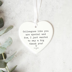 a heart-shaped ornament with a message that says "Colleagues like you are special and few, I just wanted to say a big thank you!" The message is written in a casual, handwritten style.