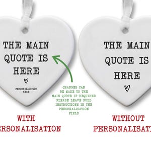 May include: Two white heart-shaped ornaments with text. One says "THE MAIN QUOTE IS HERE" with a heart and "PERSONALISATION HERE". The other says the same without the personalization. Both have a ribbon for hanging.