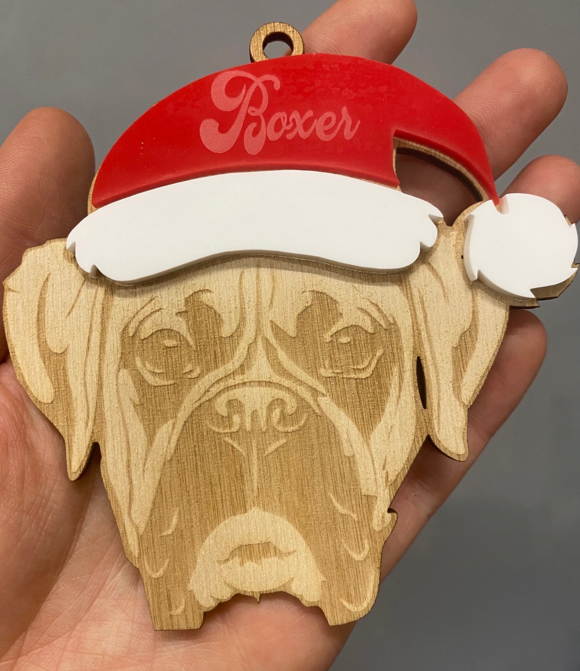 Wood Boxer Ornament with Santa hat. Can be customized