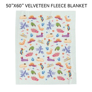 May include: A light green velveeteen fleece blanket, 50" x 60", featuring a repeating pattern of colorful sea creatures, starfish, and coral. The design includes orange, purple, green, and blue elements, creating a vibrant and whimsical aesthetic.