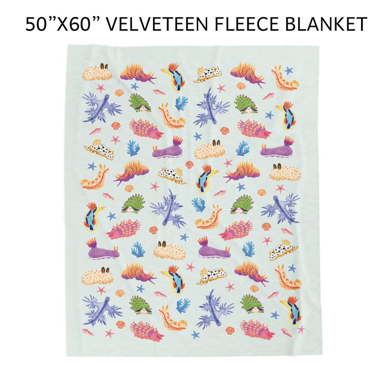 May include: A light green velveeteen fleece blanket, 50" x 60", featuring a repeating pattern of colorful sea creatures, starfish, and coral. The design includes orange, purple, green, and blue elements, creating a vibrant and whimsical aesthetic.