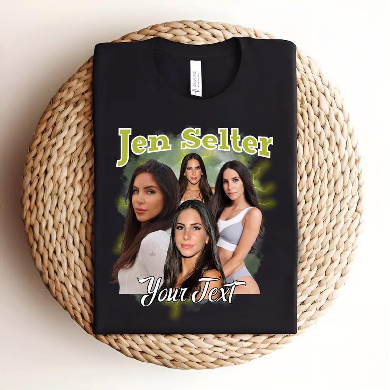 May include: Black t-shirt featuring a graphic of four women. The text "Jen Selter" is printed in green above the graphic. The text "Your Text" is printed in white below the graphic.