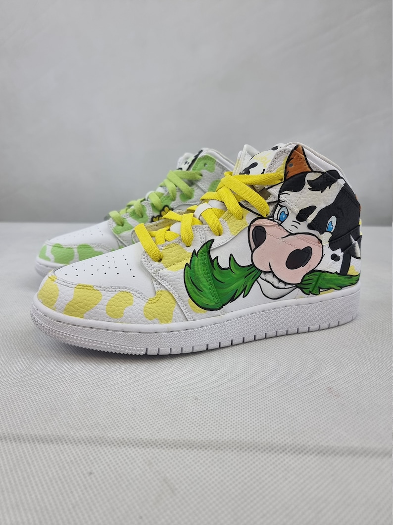low top jordan 1 cow print