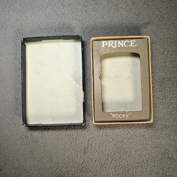 NOS Prince Rocky Flip Top Lighter - 7th Airlift Squadron