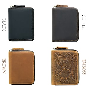 May include: Four leather wallets with zipper closures. The wallets are in black, brown, coffee, and embossed brown colors. The embossed brown wallet has a floral pattern.