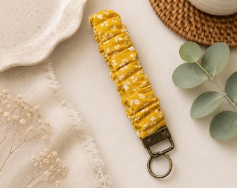 Yellow floral scrunchie keychain wristlet - handmade with rustic metal clasp