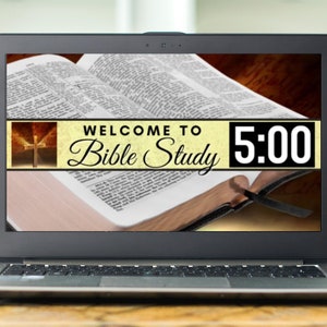May include: A laptop computer screen displaying an open Bible with the text "Welcome to Bible Study 5:00" on a yellow banner.