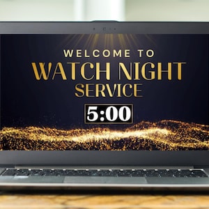 May include: A laptop screen shows the words "WELCOME TO WATCH NIGHT SERVICE" in gold. The time "5:00" is displayed in a white box. A golden, sparkling wave design is at the bottom of the screen. The laptop is open.