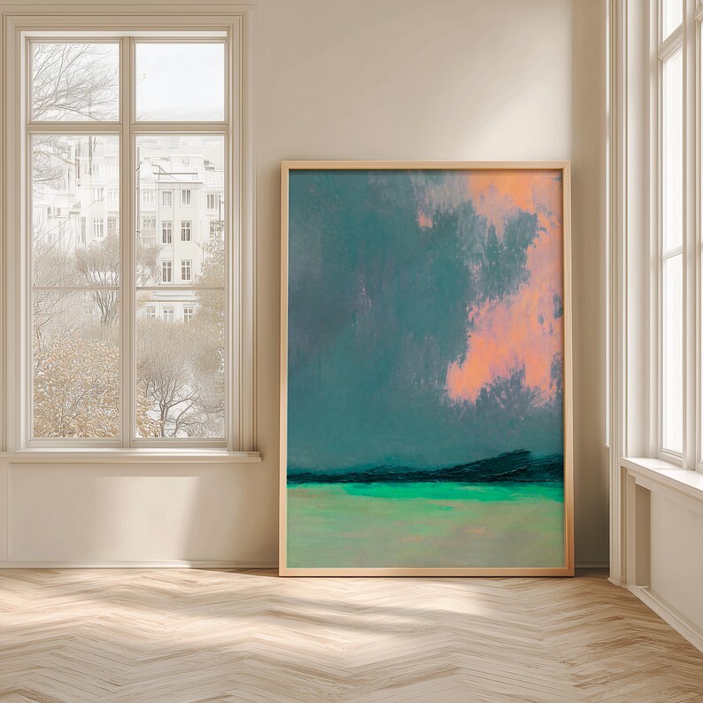 K&ouml;nnte beinhalten: Abstrakte Landschaftsmalerei in einem Holzrahmen. Das Kunstwerk zeigt einen t&uuml;rkis- und grauen Himmel mit einem Spritzer Orange. Der untere Teil hat eine gr&uuml;ne und t&uuml;rkisfarbene Landschaft.