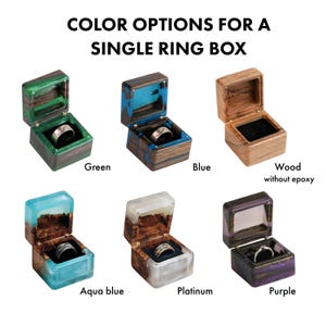 May include: Six square ring boxes with hinged lids, labeled COLOR OPTIONS FOR A SINGLE RING BOX. Variations include green, blue, aqua blue, platinum, and purple resin combined with wood, plus one plain wood box. Each box contains a single ring.