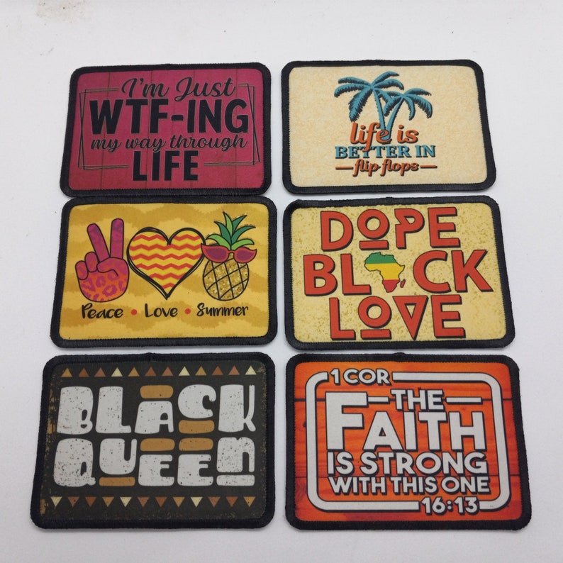 A collection of six rectangular patches with various designs and text. The patches feature phrases like "I'm Just WTF-ING my way through LIFE," "life is BETTER IN -flip flops-", and "BLACK QUEEN." Other patches include images and words.