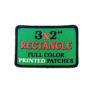 3x2 inch green custom rectangle iron-on patch with red and black printed text showing full-color print and black merrowed edge.