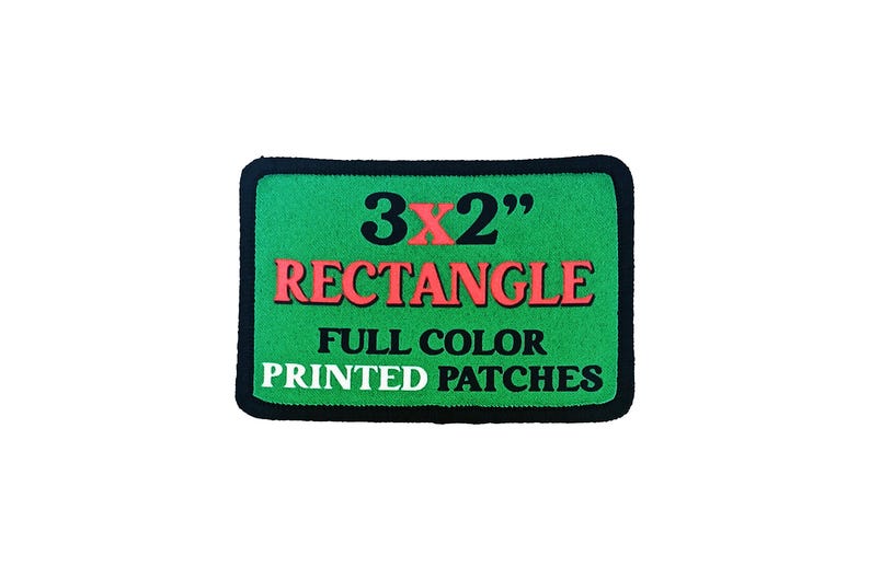 3x2 inch green custom rectangle iron-on patch with red and black printed text showing full-color print and black merrowed edge.