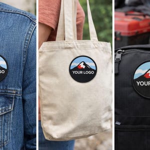 Custom round logo patches displayed on a denim jacket, canvas tote bag, and black backpack to show real-life iron-on patch applications.