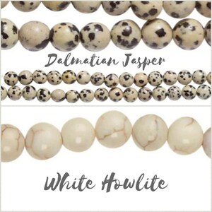 May include: Two strands of white and black Dalmatian Jasper beads and a strand of white Howlite beads. The beads are round and smooth.