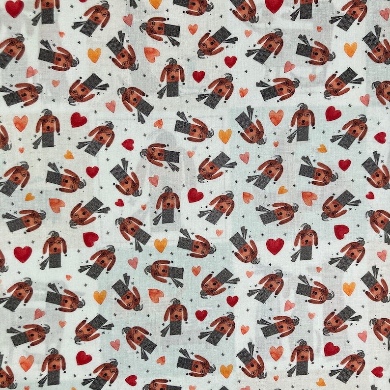 May include: White fabric with a repeating pattern of brown dachshund dogs wearing glasses and hats. The dogs are facing different directions and are in various poses. The background is white with small red hearts.