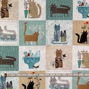 May include: A colourful fabric with a repeating pattern of cats, birds and flowers. The cats are in various poses and colours, including brown, black, blue and orange. The birds are small and perched on branches or flowers. The flowers are in shades of pink, purple and yellow. The fabric is a light blue and beige colour.
