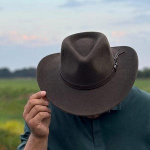 Cowboy Hat– Personalise with a Name or Initials with  Branding Iron, Western Style  cowboy hat Shapeable cowboy hat

Travel friendly western hat

Soft felt cowboy hat

Crushable outback hat

Packable festival hat

Unisex wool western hat

Water repellent cowboy hat

Outdoor rodeo hat