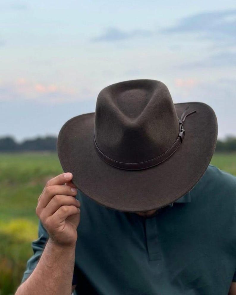 Cowboy Hat– Personalise with a Name or Initials with  Branding Iron, Western Style  cowboy hat Shapeable cowboy hat

Travel friendly western hat

Soft felt cowboy hat

Crushable outback hat

Packable festival hat

Unisex wool western hat

Water repellent cowboy hat

Outdoor rodeo hat