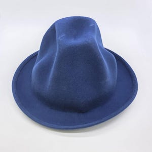 Handcrafted Oversized Wool Oversized Odd Shaped Tall Hat
Felt Hat:Custom Branding