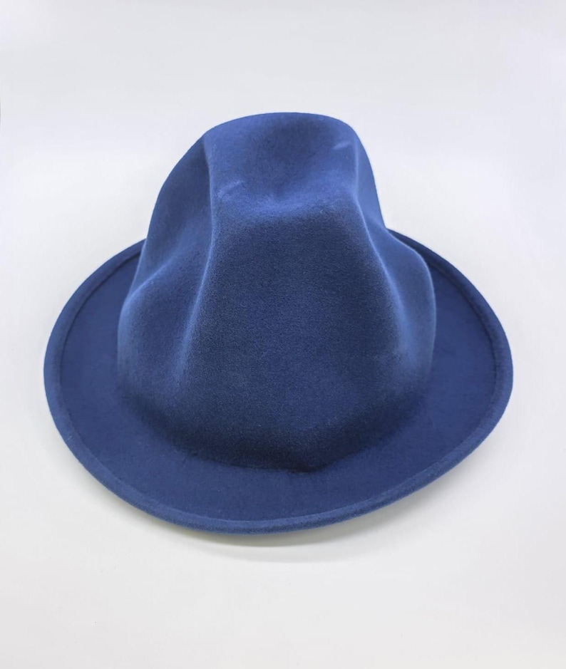 Handcrafted Oversized Wool Oversized Odd Shaped Tall Hat
Felt Hat:Custom Branding