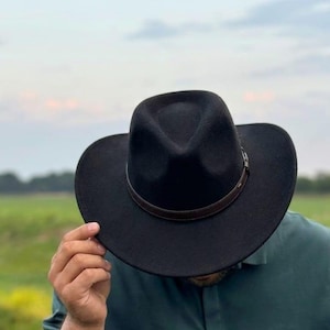 Cowboy Hat– Personalise with a Name or Initials with  Branding Iron, Western Style  cowboy hat Shapeable cowboy hat

Travel friendly western hat

Soft felt cowboy hat

Crushable outback hat

Packable festival hat

Unisex wool western hat

Water repellent cowboy hat

Outdoor rodeo hat