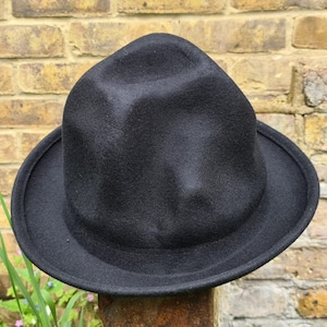 Handmade wool hat

Mountain hat

Top hat oversized

Pharrell Williams style hat

Secondary Keywords

Premium wool hat

Statement fashion hat

Unisex oversized hat

Artistic tall hat


Oversized odd shaped tall wool hat

Handmade premium wool mountain hat

Black oversized top hat

Navy tall fashion hat

One size wool statement hat

Pharrell inspired mountain hat

Marketplace / Hashtags (optional)

#OversizedHat

#MountainHat

#WoolHat

#StatementHat

#HandmadeHat

#FashionHat

#UnisexStyle