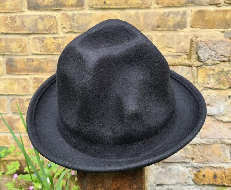 Handmade wool hat

Mountain hat

Top hat oversized

Pharrell Williams style hat

Secondary Keywords

Premium wool hat

Statement fashion hat

Unisex oversized hat

Artistic tall hat


Oversized odd shaped tall wool hat

Handmade premium wool mountain hat

Black oversized top hat

Navy tall fashion hat

One size wool statement hat

Pharrell inspired mountain hat

Marketplace / Hashtags (optional)

#OversizedHat

#MountainHat

#WoolHat

#StatementHat

#HandmadeHat

#FashionHat

#UnisexStyle