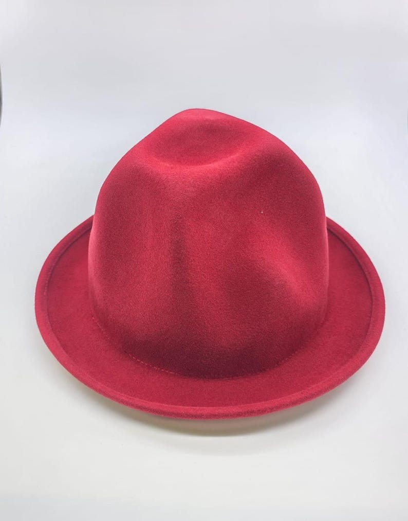 Handcrafted Oversized Wool Oversized Odd Shaped Tall Hat
Felt Hat:Custom Branding