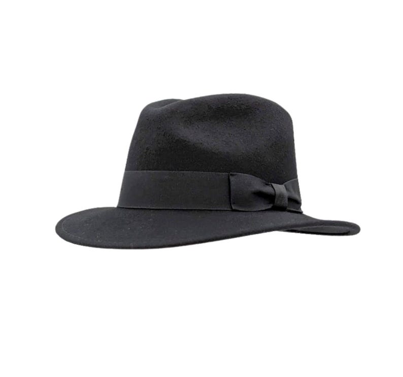 Fedora hat

Classic fedora

Men’s fedora hat

Indiana Jones fedora

1940s fedora hat

Retro fedora hat

Material & build

Wool fedora hat

Crushable fedora

Packable fedora hat

Soft wool felt fedora

Style & details

Vintage fedora

Wide brim fedora

Pinch crown fedora

Grosgrain band fedora

Classic ribbon band hat

Use & occasions

Travel fedora

Outdoor fedora hat

Everyday fedora

Film-inspired fedora