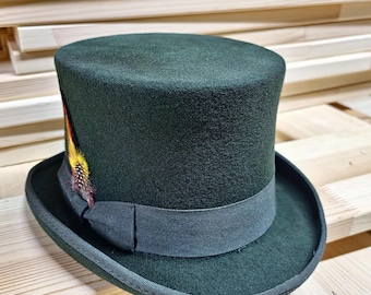 May include: A dark green top hat with a black band and a small feather accent. The hat is made of felt and has a classic design.