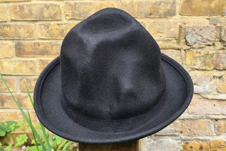 Handmade wool hat

Mountain hat

Top hat oversized

Pharrell Williams style hat

Secondary Keywords

Premium wool hat

Statement fashion hat

Unisex oversized hat

Artistic tall hat


Oversized odd shaped tall wool hat

Handmade premium wool mountain hat

Black oversized top hat

Navy tall fashion hat

One size wool statement hat

Pharrell inspired mountain hat

Marketplace / Hashtags (optional)

#OversizedHat

#MountainHat

#WoolHat

#StatementHat

#HandmadeHat

#FashionHat

#UnisexStyle