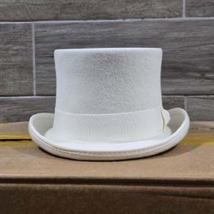 Wool Top Hat

Classic Wool Top Hat

Men's Wool Fedora

Wool Felt Top Hat

Winter Wool Top Hat

Vintage Wool Top Hat

Luxury Wool Hat

Wool Dress Hat

Formal Wool Hat

Stylish Wool Fedora

Warm Wool Top Hat

Premium Wool Hat

Wool Wide Brim Hat

Timeless Wool Top Hat

Wool Felt Fedora

Handmade Wool Top Hat

High-quality Wool Hat

Black Wool Top Hat

Custom Wool Top Hat

Elegant Wool Fedora