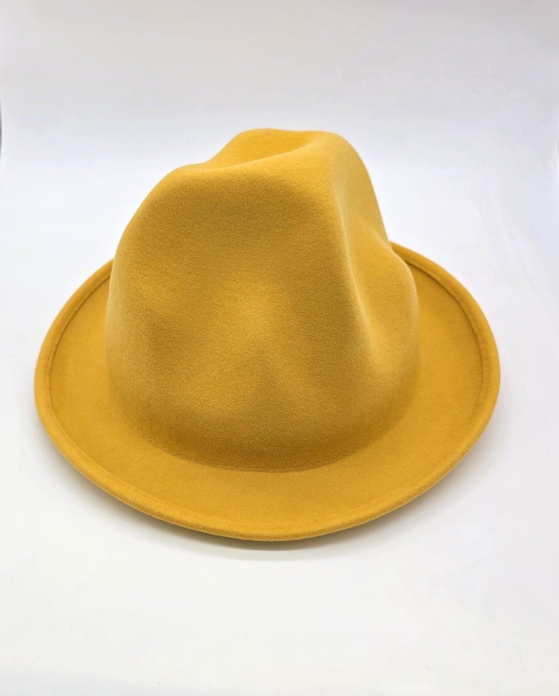Handcrafted Oversized Wool Oversized Odd Shaped Tall Hat
Felt Hat:Custom Branding