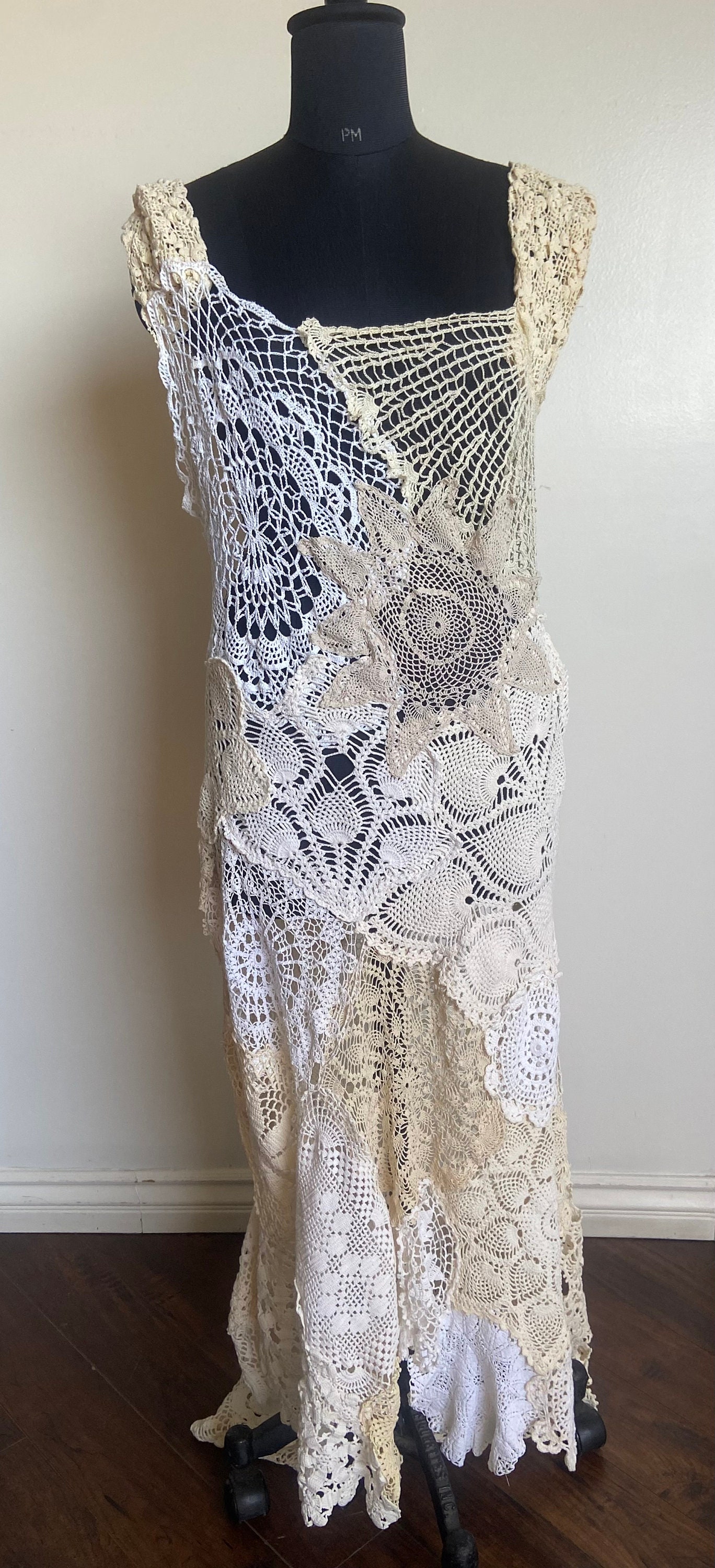 crochet doily wedding dress Lace crochet & doily details to spark your wedding day imagination  We're  inspired by the delicate craftsmanship and heirloom sentimentality that  adds texture and an old-world charm to your wedding aesthetic #