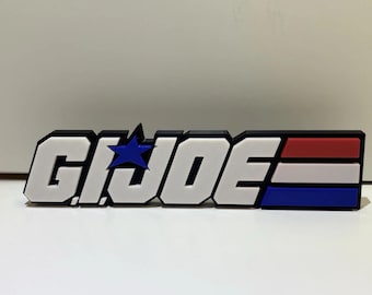Supporto per stampa 3D GI Joe con logo spesso, mensola, scrivania e montaggio a parete.