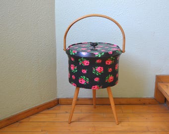 1960s sewing box, mid-century sewing basket, round sewing box, black, floral pattern, Sixties/50s/Fifties style, on legs