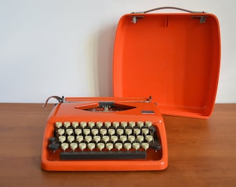 Tessy deco mechanical typewriter orange vintage Adler 70s