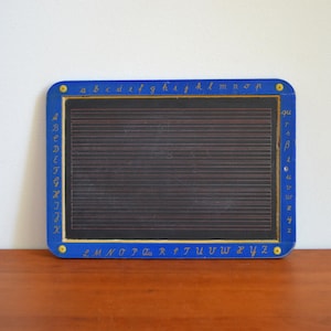 Old slate blackboard school board crown 50s 60s blue writing lines letters vintage