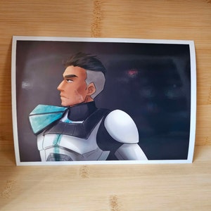 May include: A digital illustration of a character from a science fiction television show. The character is a man with short, dark hair and a white and blue uniform. He is looking to the right of the image.