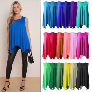 May include: A collection of 12 sleeveless tops in various colours, each with a scoop neck and a slightly asymmetrical hemline. The tops are made of a soft, stretchy fabric and are perfect for layering or wearing on their own.