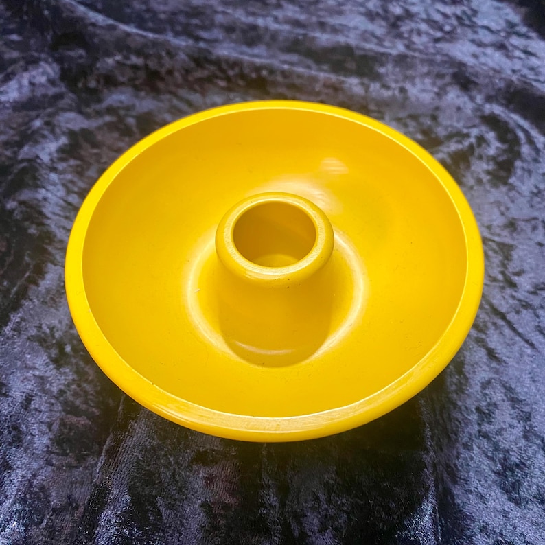 May include: A set of three ceramic mugs with a speckled, matte finish. The mugs are in shades of cream, light gray, and dark gray. Each mug has a simple, minimalist design, perfect for coffee or tea.