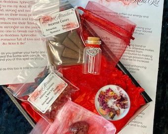 May include: A red velvet box filled with love and attraction themed items. The box contains a small bottle of herbs, a bag of red salt, a bag of incense cones, a small bag of rose petals, and a red crystal heart. The box also includes a card with the text "Love & Attraction Mini Kit" and "Roses help soften our energy and bring us up to the energy of love."