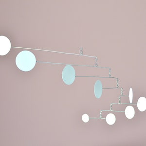 Sirius. Contemporary mobile to hang. Limited series in lacquered metal.