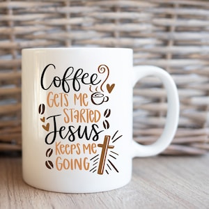 May include: White ceramic coffee mug with brown text that reads "Coffee gets me started Jesus keeps me going". The text is decorated with coffee beans, hearts, and a cross.